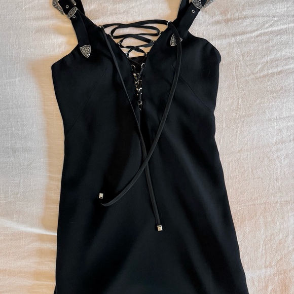 Black Plunge Neck mini dress with silver hardwear details.